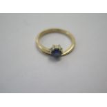 A yellow gold sapphire ring size L - approx weight 2.4 grams - surface tests to approx 9ct - good