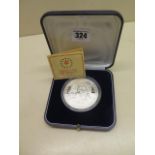 A silver proof 5oz 190th Anniversary of the Death of Admiral Nelson