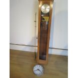A 20th century mahogany cased chronomatic electric master clock, 132cm tall, with a synchronome wall