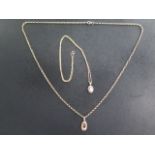 Two 9ct yellow gold chains, 46cm and 56cm, with pendants, approx 8.7 grams total