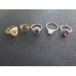 A 9ct yellow gold CZ ring, size T, 3 other 9ct rings, total approx 11.9 grams, and an 18ct ring,