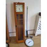 A 20th century Gents oak cased electric master clock, 128cm tall, with a TR Services 32cm diameter