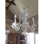 A Victorian cut glass five branch chandelier in working order - Height 67cm