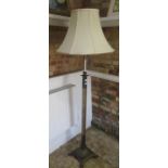 An adjustable Adams style metal standard lamp, tested and working