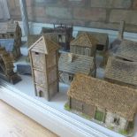 A collection of 16 resin type Wargaming buildings/outbuildings etc