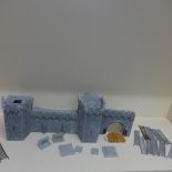 A section of Wargaming castle wall with lighting and accessories