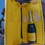 A Veuve Clicquot Traveller gift set with a 75cl bottle of champagne and two glasses