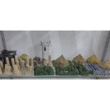 A collection of Wargaming buildings, ruins, hedge rows and stone walls