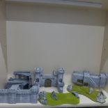 Three foam castle Wargaming buildings, a ruin and four grassed outcrops