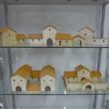 Wargaming - a collection of buildings with orange tile roofs, one roof missing