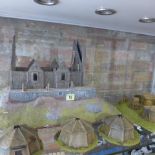 A Wargaming building - 50cm x 36cm - possibly Rohan, an encampment and three huts