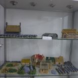 A good collection of Wargaming stone walls, buildings, a bridge, outcrops etc