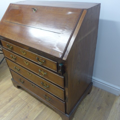 A Georgian mahogany bureau with a well fitted interior over four drawers - Width 84cm x Height 96cm - Image 3 of 4