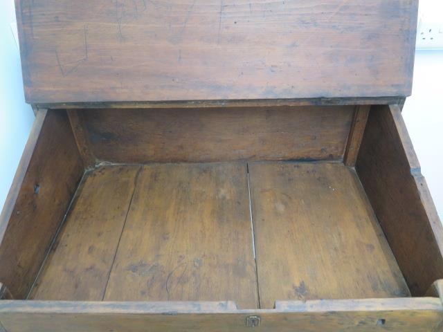 A 19th century clerks desk with lift up sloping top on turned legs, 105cm tall x 99cm x 70cm - Image 2 of 2