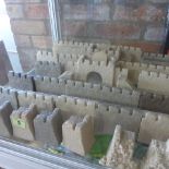A collection of Wargaming resin type castle walls, 20cm x 10cm sections, three gate sections, nine