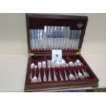 An 8 setting canteen of silver cutlery by Mint Cutlery Sheffield 1986 with four silver table