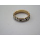An 18ct yellow and white gold ring size P - approx weight 6 grams - in good condition