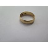 A 9ct hallmarked yellow gold band ring size T - approx weight 5 grams - band 6mm - generally good,