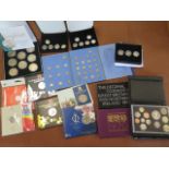 A collection of proof coins, three proof sets and Georgian and later coins and a British