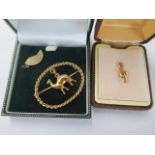 A gilt metal camel brooch, a gilt metal tie pin and a part pendant - brooch weight approx 6 grams