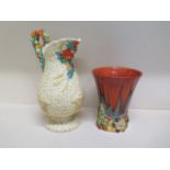 A Clarice Cliff Bizarre relief moulded trumpet vase - Height 17cm and a Celtic Harvest jug -