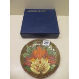 A circa 1977 Moorcroft Flame of the Forest coaster 78016 - Diameter 16cm - in good condition - boxed