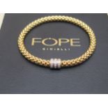 A Fope 18ct yellow gold Flex It Solo triple diamond expanding bracelet - in very good condition with