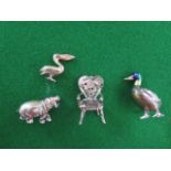 Three silver ornaments in the form of a Hippo, Pelican and Duck and a filigree chair - Height 3.