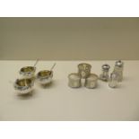 Three silver cauldron shaped salts Birmingham 1940/41 H.P & Co with three silver ladle spoons,