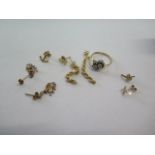 A 9ct yellow gold ring size O and four pairs of 9ct gold earrings - total weight approx 4.3 grams
