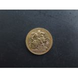 A Victorian gold full sovereign coin dated 1888