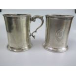 A pair of silver plated tankards - Height 12cm - both engraved, some wear to one, other generally