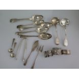 Five silver table spoons, a pair of silver ladles, a pair of mustard spoons, forks, knife, nips