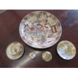 A Satsuma lidded pot 8cm diameter, a cup and saucer and a plate 15cm diameter, all good condition,