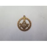 A 9ct yellow gold Masonic fob - 20mm wide - approx weight 1.9 grams - generally good