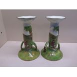 A pair of Royal Doulton hunting candlesticks - Height 24cm - both with some crazing but generally