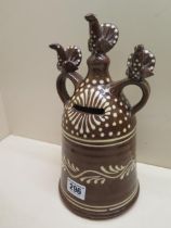 A Slipware money box by well known potter Paul Young - Height 26cm - in good condition - www.