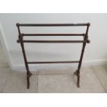 A stained beechwood towel rail - Height 85cm x Width 70cm