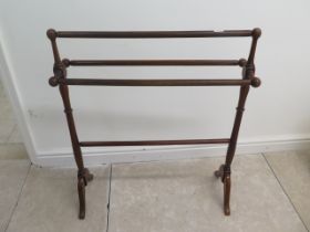 A stained beechwood towel rail - Height 85cm x Width 70cm