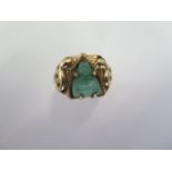 An Oriental yellow gold Jade Buddha ring size R - approx weight 9.5 grams - generally good,