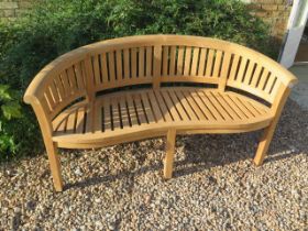 A new good quality teak banana bench - 150cm