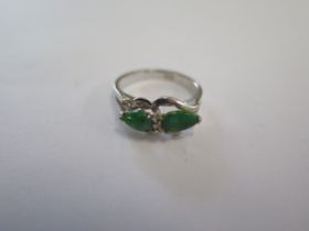 A white metal Jade and Diamond ring marked 811 - ring size K - approx weight 1.7 grams - in good