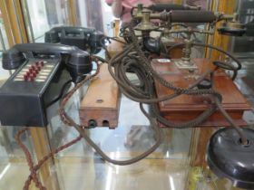 A Sterling Primax vintage wooden internal telephone and a black bakelite internal telephone