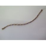 A 9ct yellow gold amethyst and diamond bracelet - Length 18cm - approx weight 6.5 grams - in good