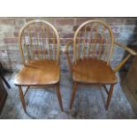 Two Ercol dining chairs including a carver