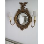 A Georgian style gilt wood wall mirror with two side lights