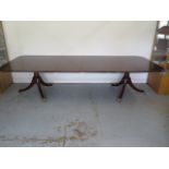A good quality Georgian style mahogany twin pedestal dining table with two middle leaves - Height