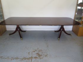 A good quality Georgian style mahogany twin pedestal dining table with two middle leaves - Height