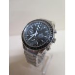 An Omega Speedmaster mk40 ref 3520.50 - in good working order and good condition (full set) with