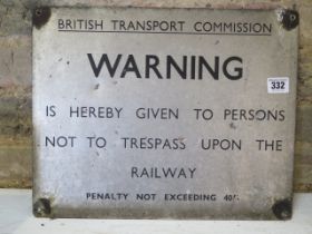 A British Transport Commission Warning is Hereby Given to Trespassers' alloy railway sign - some